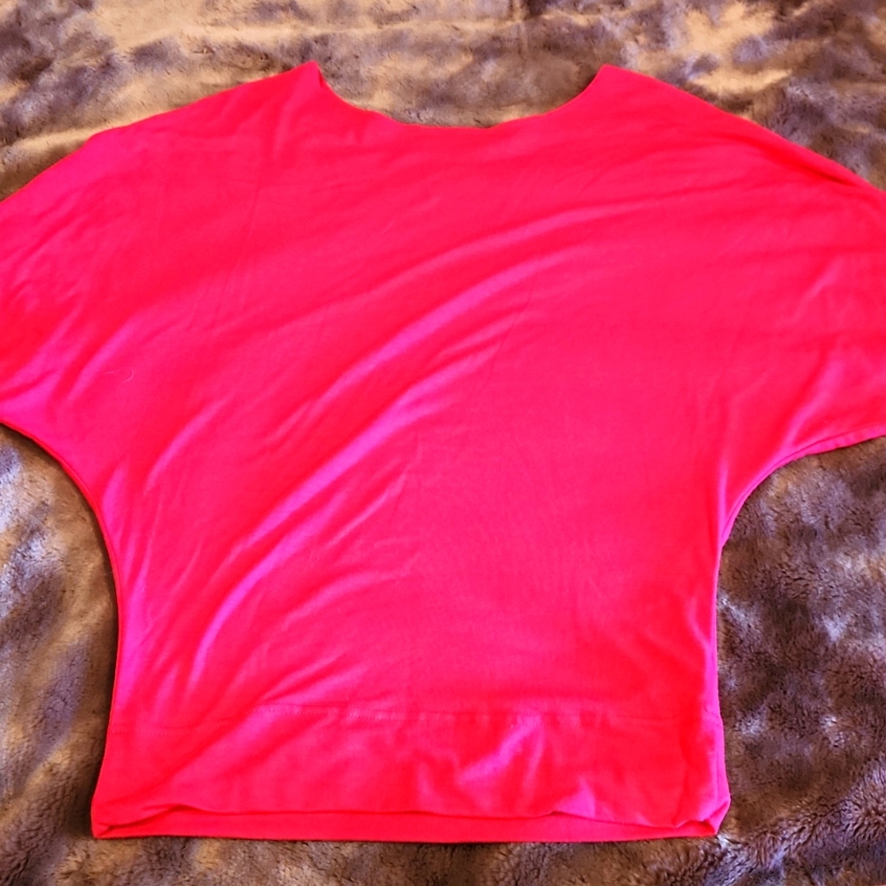 A pink blouse.
